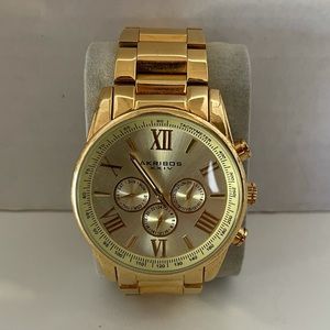 Men’s Akribos Gold Style watch. Working